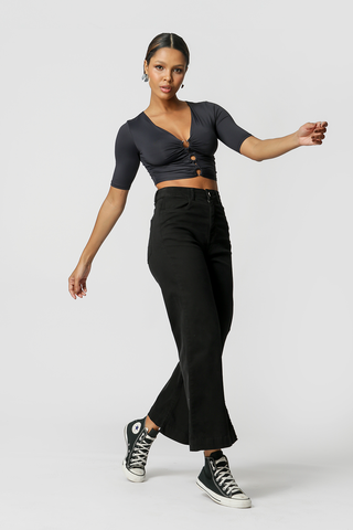 Blusa calada con anillas - NEGRO