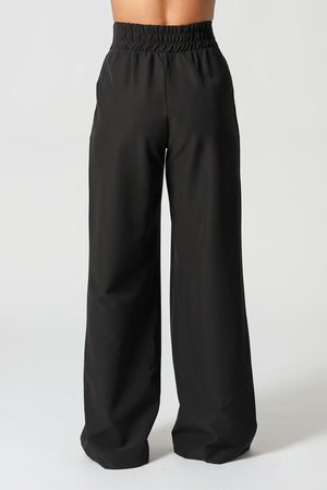 Calça Minimalista Alfaiataria com Botão Dourado