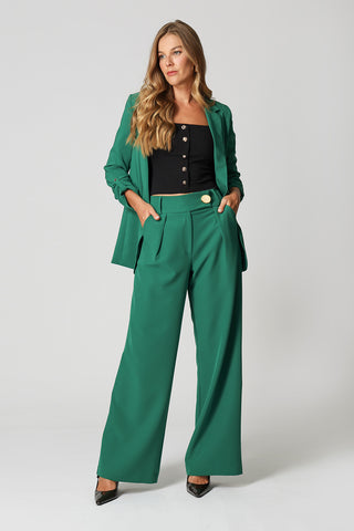 Pantalones minimalistas de pierna ancha con botón dorado - GARRAFA