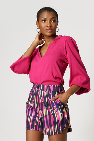 Blusa con mangas abullonadas - FUCSIA