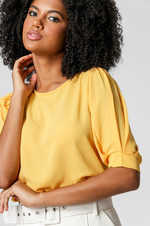 Blusa con mangas abullonadas - SOL